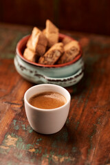 Cup of coffee on rustic wooden background. Soft focus. Copy space