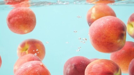 Fresh Ripe Peaches Dive into Crystal Water with Bubbles - Powered by Adobe