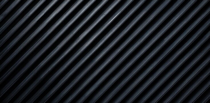 A close-up view of a dark, textured surface with diagonal parallel lines, creating a sense of depth and order.