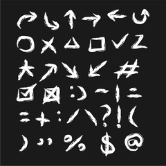 Hand-drawn symbols set arrows, shapes, and punctuation marks. Creative doodle elements for design projects