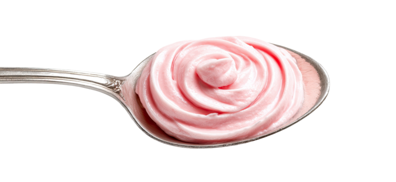 Pink whipped topping swirls on a silver spoon