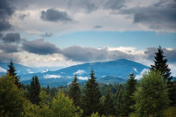 Scenic mountain landscape under cloudy sky