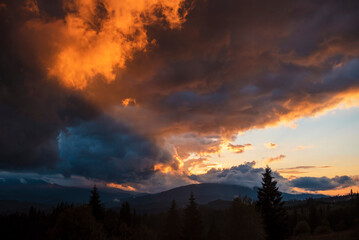 Dramatic Sunset Over Mountainous Landscape