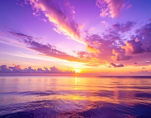 A stunning purple and orange sunset over the calm ocean, with soft clouds painted in vibrant hues and a glowing sun reflecting on the gentle waves.

