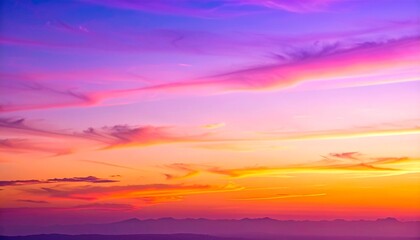 Colorful sunset sky with gradient tones of purple, pink, orange, and yellow, creating a vibrant and dreamy evening atmosphere.
