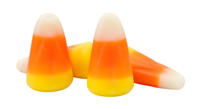 Three pieces of candy corn, a classic halloween candy, isolated on transparent background