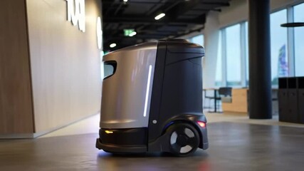 Autonomous Delivery Robot Navigating Modern Office Space, Futuristic Technology