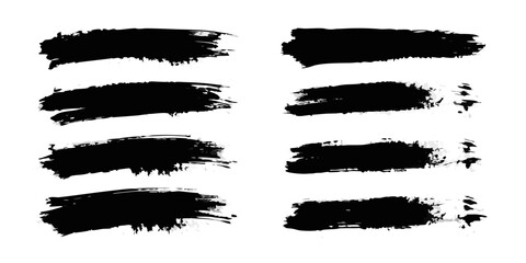 Collection of eight black ink brush stroke textures on a white background