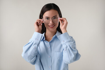 Portrait of confident businesswoman on white background