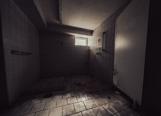 Abandoned attic interior with old wooden chairs and table under a damaged ceiling, sunlight...