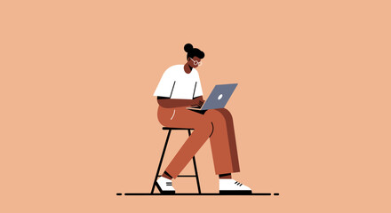 An focused individual sits on a stool, diligently working on a laptop against a clean background. Ideal for themes of remote work, online learning, productivity, and modern digital lifestyles.