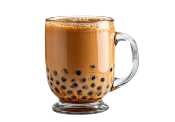 Clear glass mug filled with a light brown drink, topped with froth, and studded with dark brown tapioca pearls