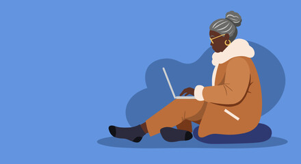 Mature Black woman focused on her laptop, depicting modern technology use, digital learning, and engaged senior lifestyle.