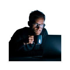 Focused Man Working Late on Laptop with Coffee