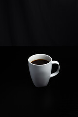 Minimalist White Coffee Mug on Black Background