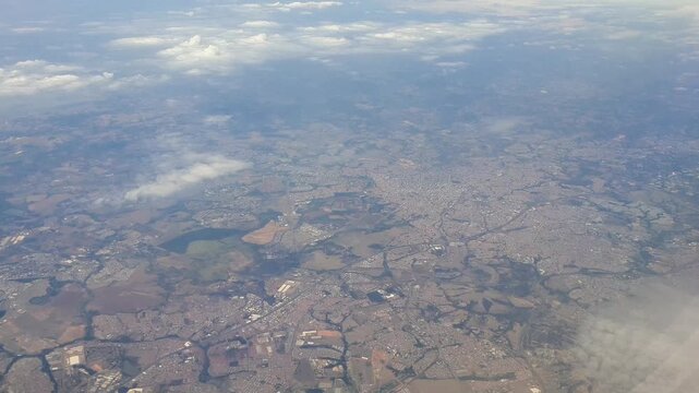 Overflying the city of Campinas in the state of Sao Paulo, Brazil. Horizontal footage. 