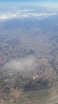 Overflying the city of Campinas in the state of Sao Paulo, Brazil. Vertical footage. 