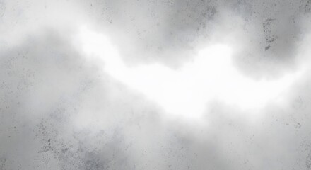 Abstract white and grey grunge background with a smoky or cloudy texture. A bright light effect creates a subtle and minimalist design element, good for backdrops.