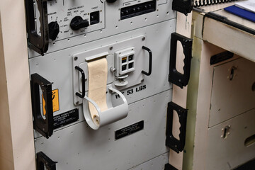 Nuclear missile launch station. Computer printer readout indicates system status.