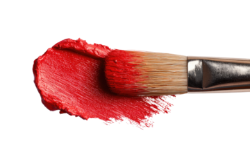 Close-up of a red lipstick smear with a paintbrush