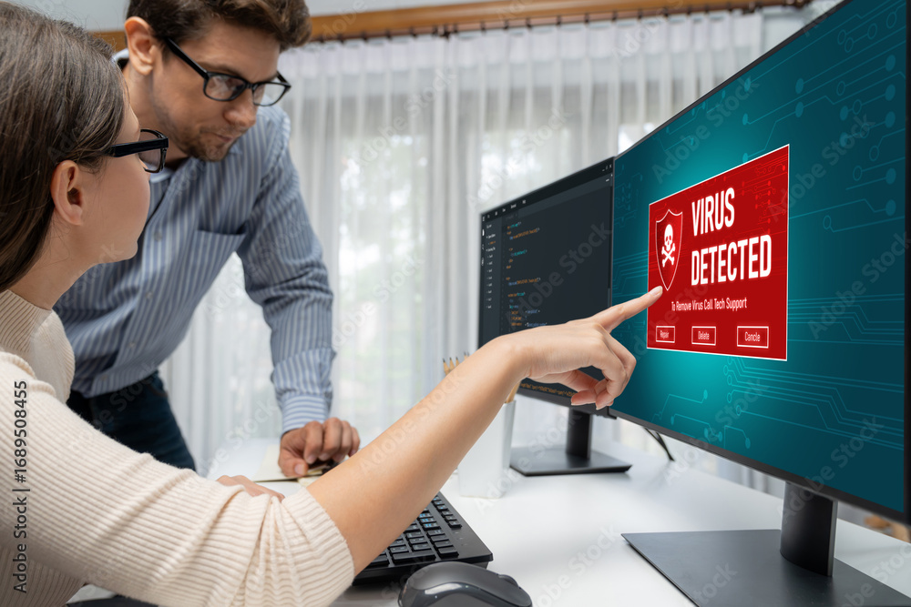 Poster virus warning alert on computer screen detected brisk cyber threat , hacker, computer virus and malw