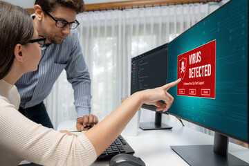 Virus warning alert on computer screen detected brisk cyber threat , hacker, computer virus and...