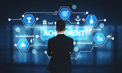 A business professional stands in front of digital icons representing achievement and success, analyzing modern concepts of goals and advancements in the workplace environment. Tessel