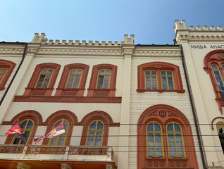 Row of historic European buildings with large windows and detailed facades in Belgrade, Serbia....