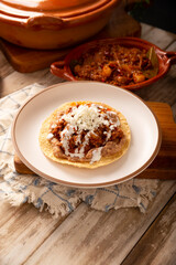 Ground beef tinga toast, a traditional Mexican home-cooked dish consisting primarily of beef cooked with chipotle chili and lots of onion, is traditionally eaten on 