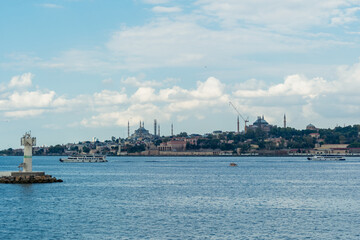 Naklejka premium Istanbul, Turkey. Scenic view of the Bosphorus Strait with the historic Maiden’s Tower. Cultural heritage, architecture, and the iconic beauty of Istanbul.