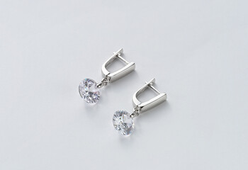 Stud earrings. Earrings with diamonds. Gold jewelry. Silver jewelry.