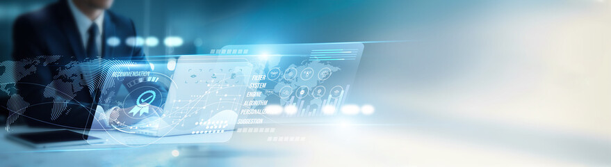 Data analyst using a laptop to develop AI-powered recommendation engines, personalization systems,...