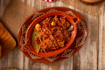 Ground beef tinga, a traditional Mexican home-cooked dish consisting primarily of beef cooked with...