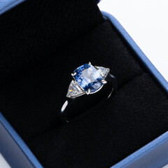 Ring with sapphire. Luxurious gold ring.