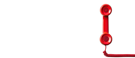 Red vintage telephone handset against a black background