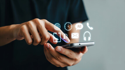 Person using a smartphone with holographic icons for various apps and services mobile phone hands