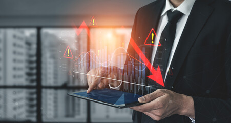 Economic caution visualized with fluctuating market graph, alert symbols, and negative data trends. Represents financial risk, market volatility, and economic uncertainty. Spline