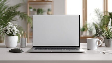 Modern home office setup featuring a laptop mouse mug and lush green plants
