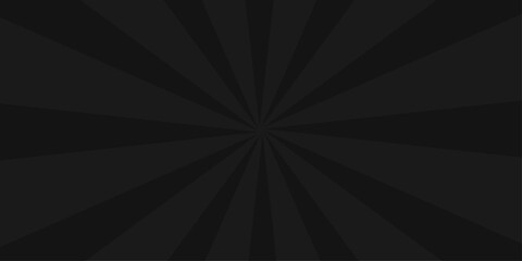 Abstract sunburst vector design on a black and white grunge background with a vintage ray pattern
