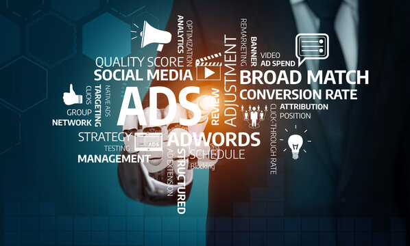 A businessman engages with digital marketing concepts, focusing on ads metrics in a contemporary office setting, highlighting the importance of online advertising strategies. Tessel