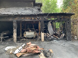 The front of a home that was burned © Dylan Hatfield