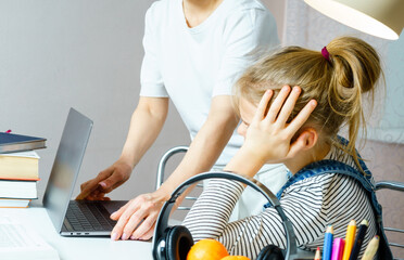 Mother Arguing With Teenage Daughter Over Online Activity taking away laptop