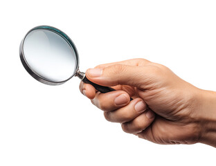 A hand holds a magnifying glass