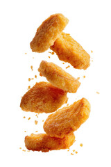 Crispy, golden-brown food pieces, stacked in mid-air, against a black background.  Slight crumbs or dust are visible around the pieces