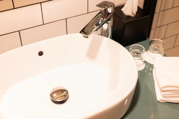 plumbing washbasin modern in hotel in bathroom with towels