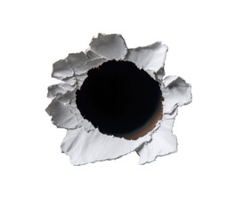 Close-up bullet hole in white material