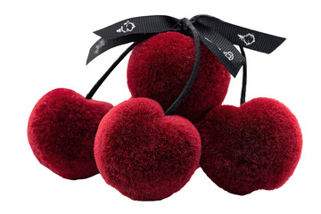 A cluster of four deep red heart-shaped pom-poms, each attached to a black hair tie with a ribbon bow