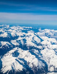 Snowy mountain range aerial view