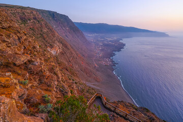 Scenic sunset view of El Hierro Island coast, seen from Mirador La Pena, Canary Islands, Spain,...