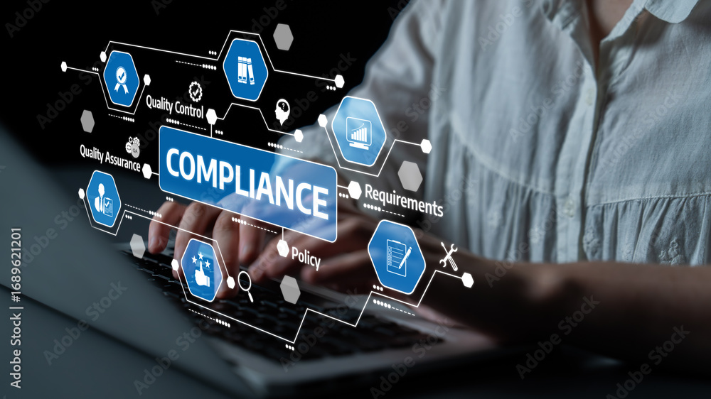 Aufkleber a professional working on a laptop showcases the importance of compliance management through quality